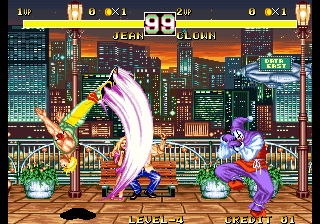 Jean using his flash kick, 'Flick Flack', while Clown stands back and blocks.